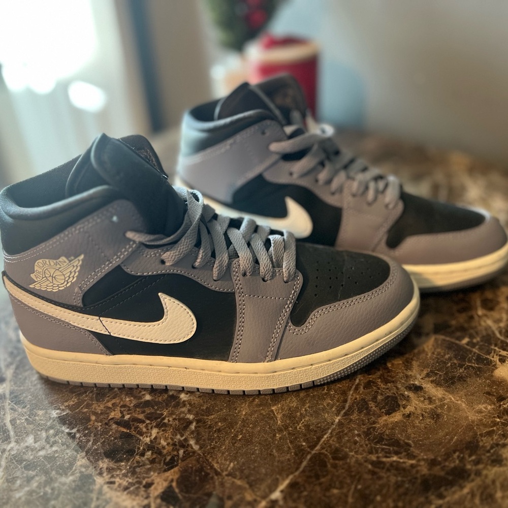 Nike woman’s Air Jordan 1 Mid Cement Gray